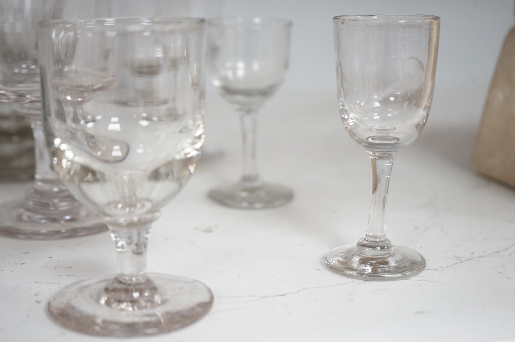 Sixteen George III and Victorian rummers and sherry glasses, largest 14cm high. Condition - mostly good